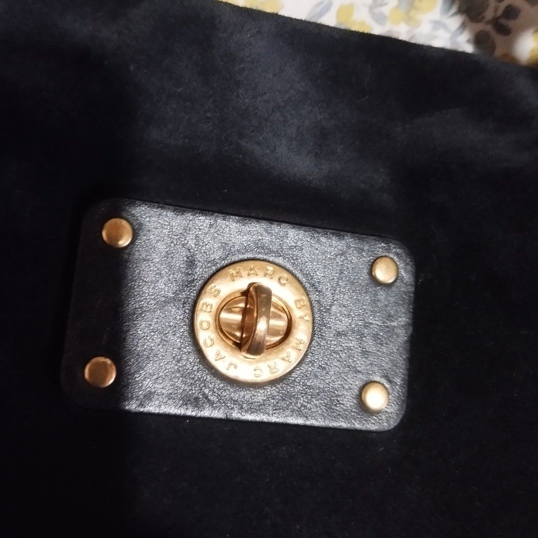 Marc by Marc Jacobs Black Suede Shoulder Bag (Category: Cross-body Bags) located in Manila. Submitted by lene48 (Listing ID 1464360839, Image 2). Description: - Brand: Marc by Marc Jacobs - Material: Black Suede - Hardware: Gold-tone - Features: Top handle, detachable shoulder strap - Interior: Signature logo print lining - Capacity: Spacious, perfect for essentials, orig made in indonesia.