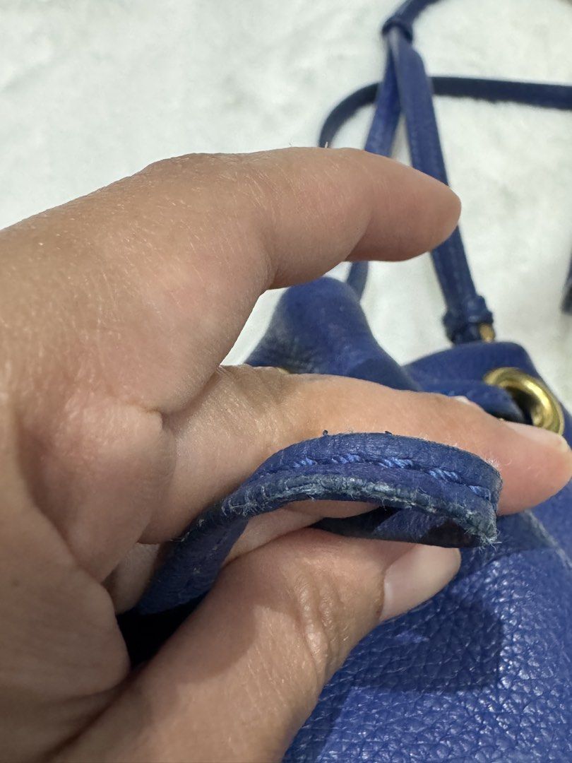 Marc by Marc Jacobs Blue Leather Bucket Bag (Category: Luxury Bags & Wallets) located in San Nicolas. Submitted by ihascat (Listing ID 1464449652, Image 2). Description: - Authentic Marc by Marc Jacobs blue leather bucket bag - Secure drawstring closure with elegant gold hardware - Adjustable shoulder strap for comfortable wear - Minor wear on edges and strap, as shown in photos - Ideal for everyday use, stylish and practical.