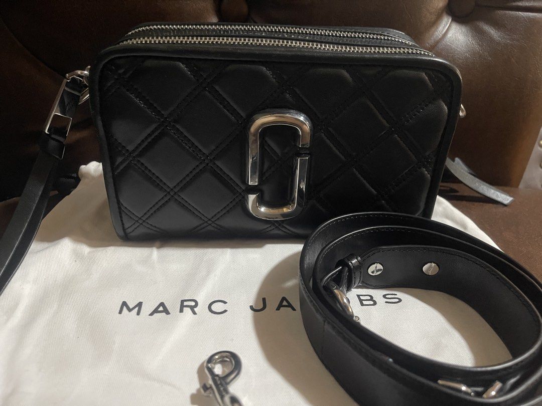 Marc Jacobs Black Quilted Leather Camera Bag (Category: Luxury Bags & Wallets) located in Malabon City. Submitted by charlize.ph (Listing ID 1464391700, Image 1). Description: - Black quilted leather camera bag by Marc Jacobs - Signature silver MJ logo hardware - Double zip closure - Detachable leather strap - Dust bag included - Ideal for everyday use.