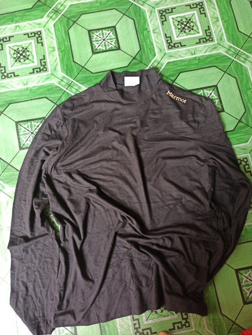 Marmot Black Long Sleeve Shirt (Category: Longsleeves) located in Tagbilaran City. Submitted by delasierra39181 (Listing ID 1464385407, Image 1). Description: - Black Marmot long-sleeved shirt - Size: 105cm - Material: Polyester and Spandex blend - Ideal for outdoor activities or layering - Comfortable and breathable fabric - Care instructions on tag - Selling as is.
