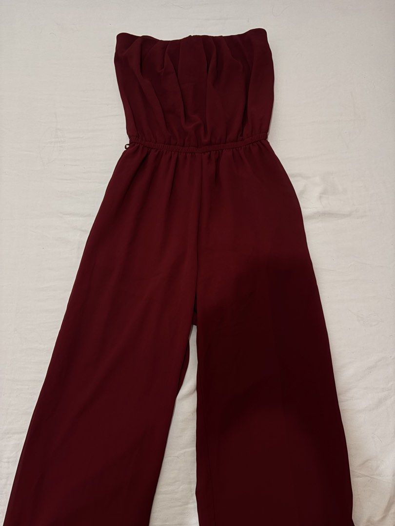 Maroon Strapless Wide Leg Jumpsuit (Category: Jumpsuits) located in Cavite. Submitted by kyeomeshi97 (Listing ID 1464421210, Image 1). Description: - Strapless jumpsuit in a deep maroon color (plum/burgundy) - Comfortable elasticated waist. - Stylish wide leg design. - Versatile for night outs or casual events w inner lining from bust to thighs (shorts).