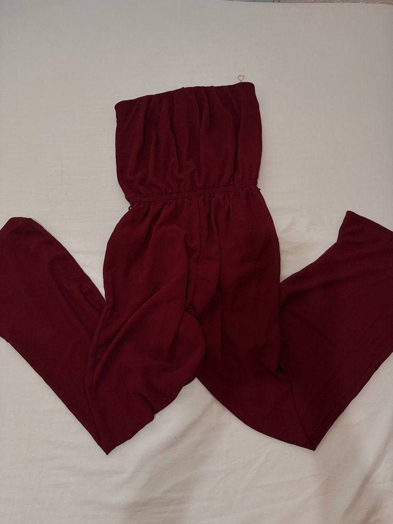 Maroon Strapless Wide Leg Jumpsuit (Category: Jumpsuits) located in Cavite. Submitted by kyeomeshi97 (Listing ID 1464421210, Image 2). Description: - Strapless jumpsuit in a deep maroon color (plum/burgundy) - Comfortable elasticated waist. - Stylish wide leg design. - Versatile for night outs or casual events w inner lining from bust to thighs (shorts).
