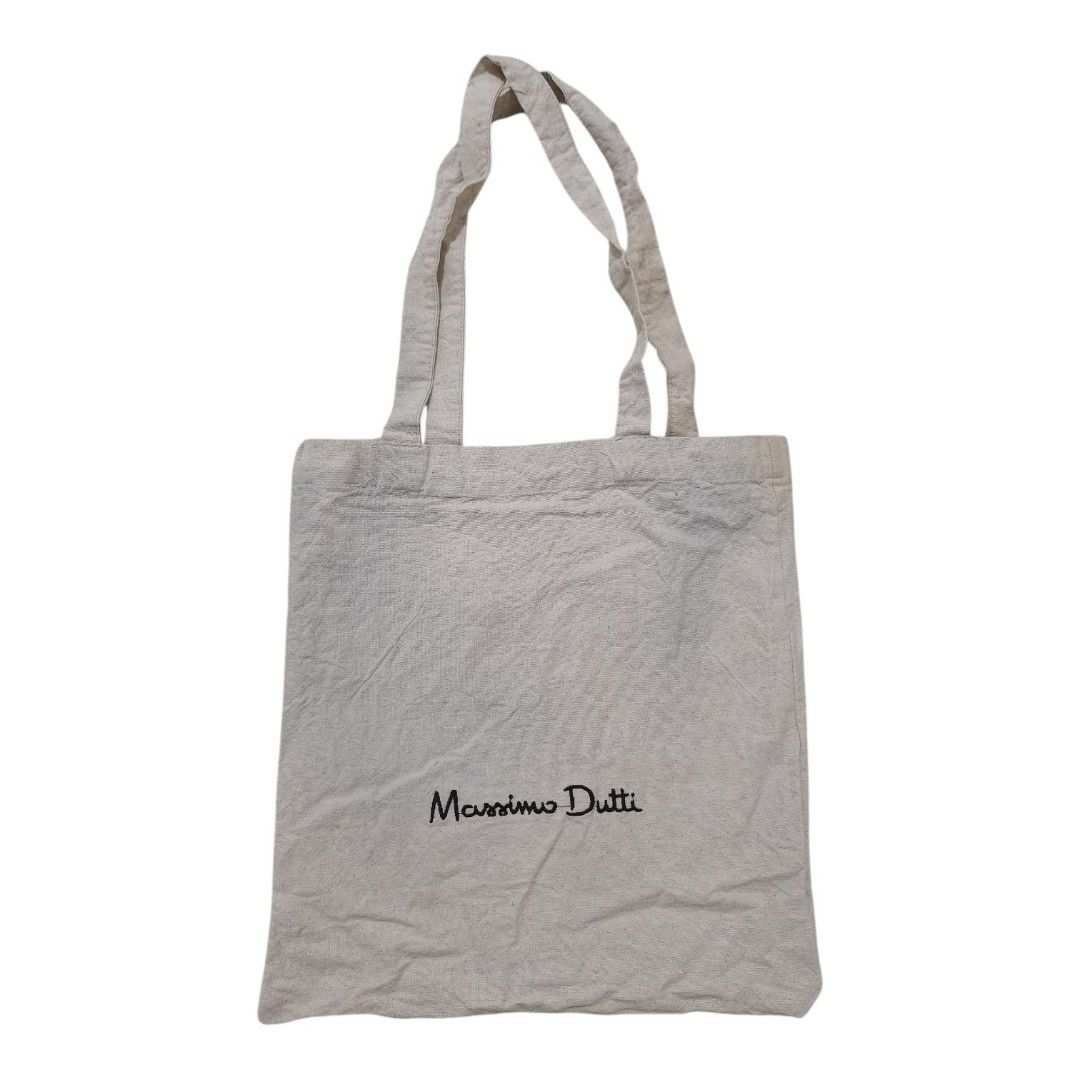Massimo Dutti cotton tote bag (unisex) (Category: Tote Bags) located in Santa Cruz. Submitted by oddpenguin-4575 (Listing ID 1464530544, Image 1). Description: 📌.....P L E A S E R E A D..... 📌measurement:L-13" /W-12" 📌color-9/10 📌Brand:Massimo Dutti 📌issue:sign of usage 📌Actual shades may differ slightly depending on ambient lighting conditions. 📌"Thrift Disclaimer: Items are pre-owned. Expect minor flaws like washable marks or storage dus