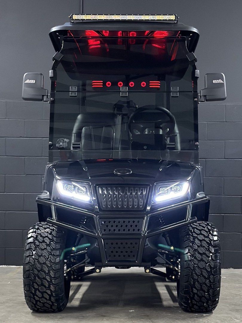 Maverick 4 plus! Lithium Custom Golf Cart (Category: Golf) located in Laoag. Submitted by silvershark_0dfaf9 (Listing ID 1464377580, Image 2). Description: - Customized black 6-seater golf cart - Bright LED light bar on top - Accent lighting - Aggressive tires - Custom rims - Tinted windshield - Tinted side mirrors - Powerful and stylish - Ready for the course or neighborhood cruising.