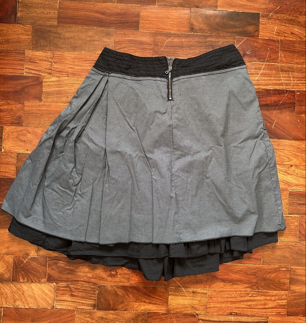 MAX&Co. Striped Pleated Skirt (Category: Skirts) located in Cainta. Submitted by buy.preloved (Listing ID 1464375425, Image 3). Description: - Max&Co. black and white pinstripe skirt - Black waistband with textured detail - All-around pleats - Includes black underskirt - Zipper closure at the back - Versatile for casual or smart casual outfits.