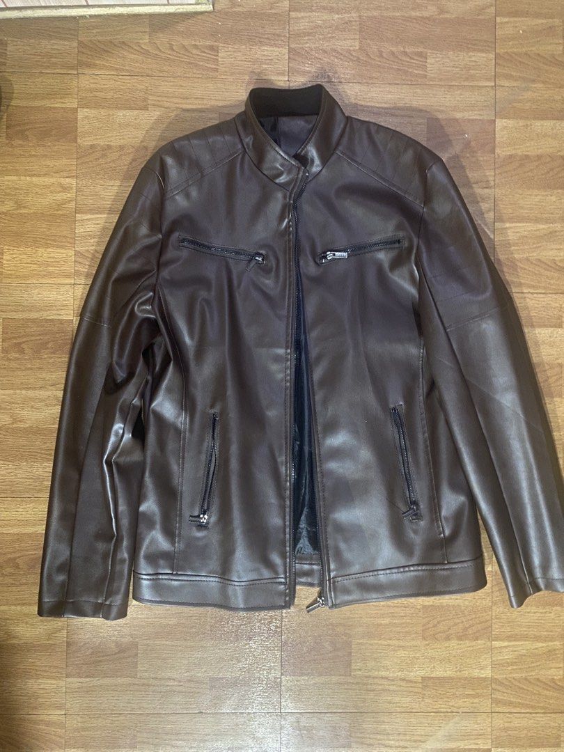 Men's Brown Faux Leather Biker Jacket (Category: Coats, Jackets and Outerwear) located in Mandaluyong City. Submitted by gabb_bautista (Listing ID 1464473526, Image 1). Description: - Cool brown faux leather jacket - Zip-up front closure - Multiple zip pockets for convenience - Stylish stand-up collar design - Ideal for casual wear and layering - Sharp and fashionable look Negotiable price.