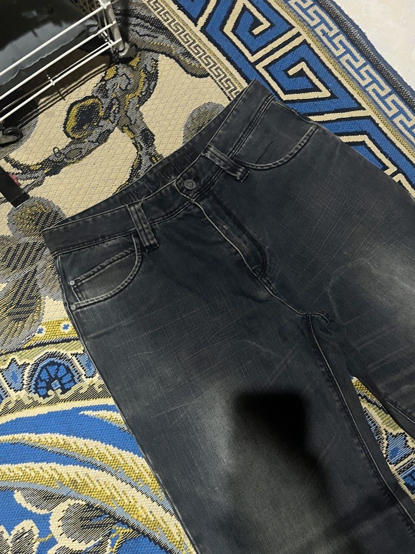 Men's Dark Wash Bootcut Jeans (Category: Jeans) located in Davao. Submitted by aleck.collections (Listing ID 1464450994, Image 2). Description: W-32 L-43.5 - Dark wash denim jeans - Bootcut fit cut - Classic five-pocket styling - Button and zip fly closure - Subtle fading on thighs and knees - Versatile for casual or smart-casual outfits - Great for everyday wear.