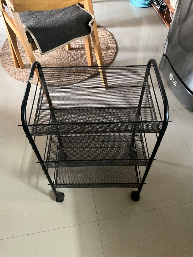 Metal 3-tier Cart with wheels (Category: Storage Boxes & Baskets) located in Pasig City. Submitted by rosequartzz_ (Listing ID 1464377486, Image 1). Description: Visible signs of wear Made of metal mesh, sturdy Can be used for organizing office/art materials.