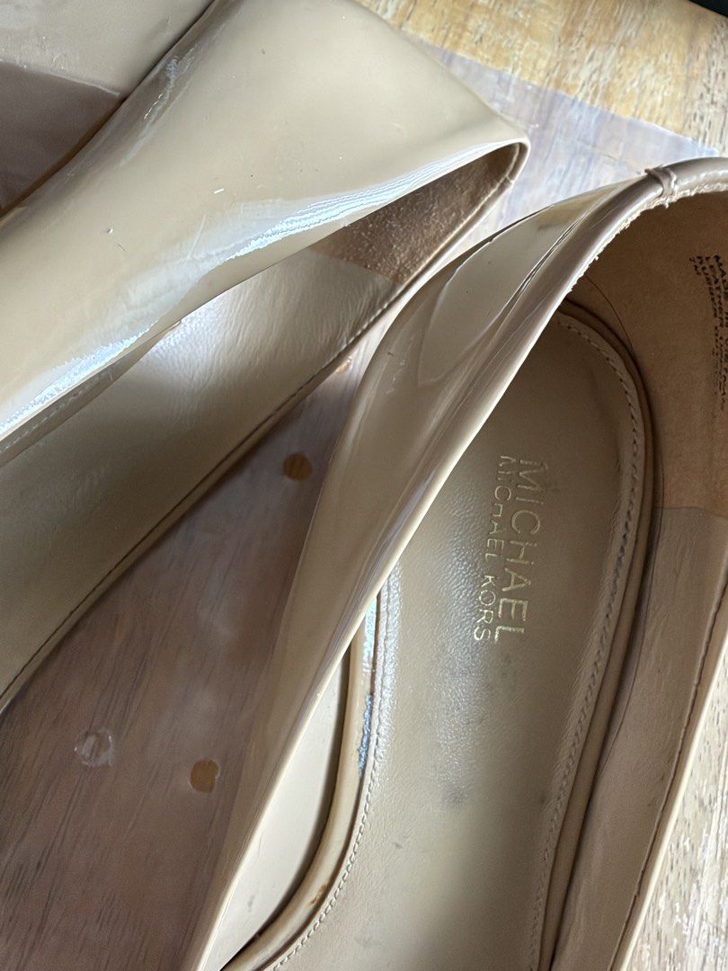 Michael Kors Patent Leather Block Heels (Category: Heels) located in Quezon City. Submitted by theblessedmars (Listing ID 1464371710, Image 3). Description: - Neutral beige/tan color - Stylish square toe - Decorative buckle detail on the front - Comfortable block heel - Soles show some slight signs of wear - Perfect for dressing up for an occasion or daily office wear - RFS : Decluttering.