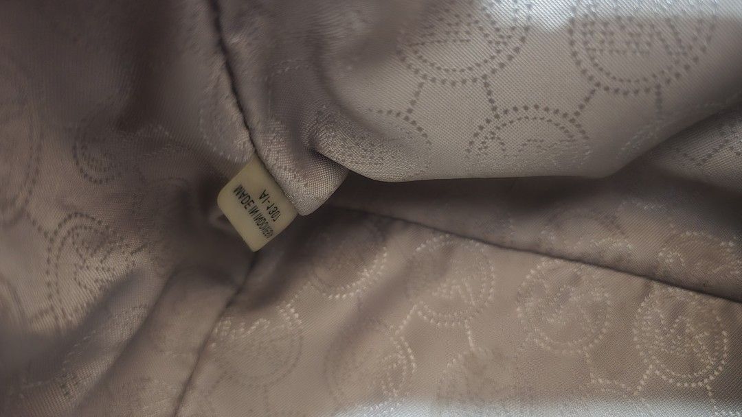 Michael Kors Pink Leather Studded Satchel Bag (Category: Luxury Bags & Wallets) located in Quezon City. Submitted by mbpreloved65 (Listing ID 1464367940, Image 3). Description: - Michael Kors satchel bag - Lovely light pink color - Silver stud detailing on sides - Top handles - Detachable shoulder strap - Interior zip pocket - Interior key clip - Clean inside and out - Great everyday bag.