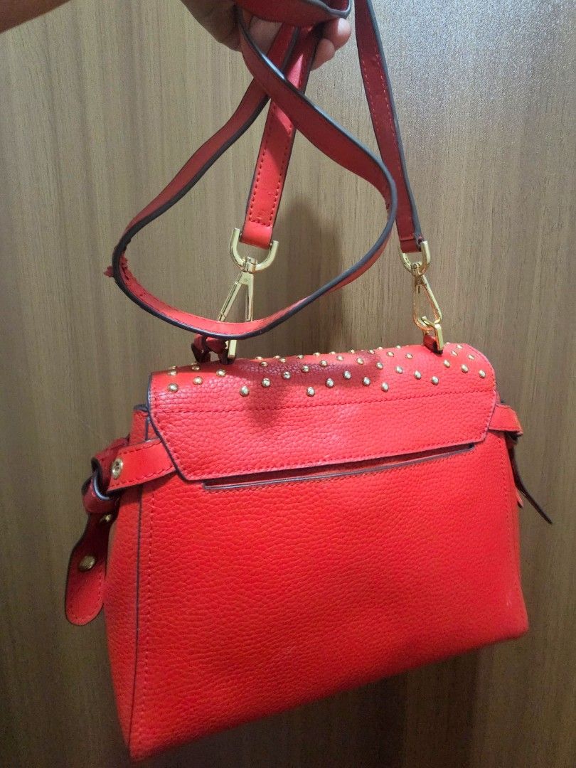 Michael Kors Red Satchel Bristol shoulder bag (Category: Shoulder Bags) located in Manila. Submitted by shopaholicmimi (Listing ID 1464474757, Image 3). Description: preloved and in good condition rare, not legacy, vintage, coach, ergo, laurel, carly, zoe, soho, y2k.