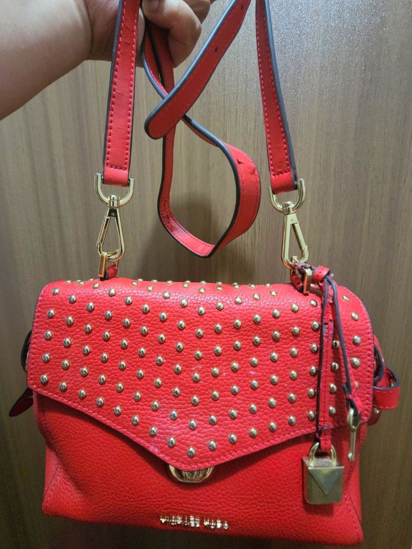Michael Kors Red Satchel Bristol shoulder bag (Category: Shoulder Bags) located in Manila. Submitted by shopaholicmimi (Listing ID 1464474757, Image 2). Description: preloved and in good condition rare, not legacy, vintage, coach, ergo, laurel, carly, zoe, soho, y2k.