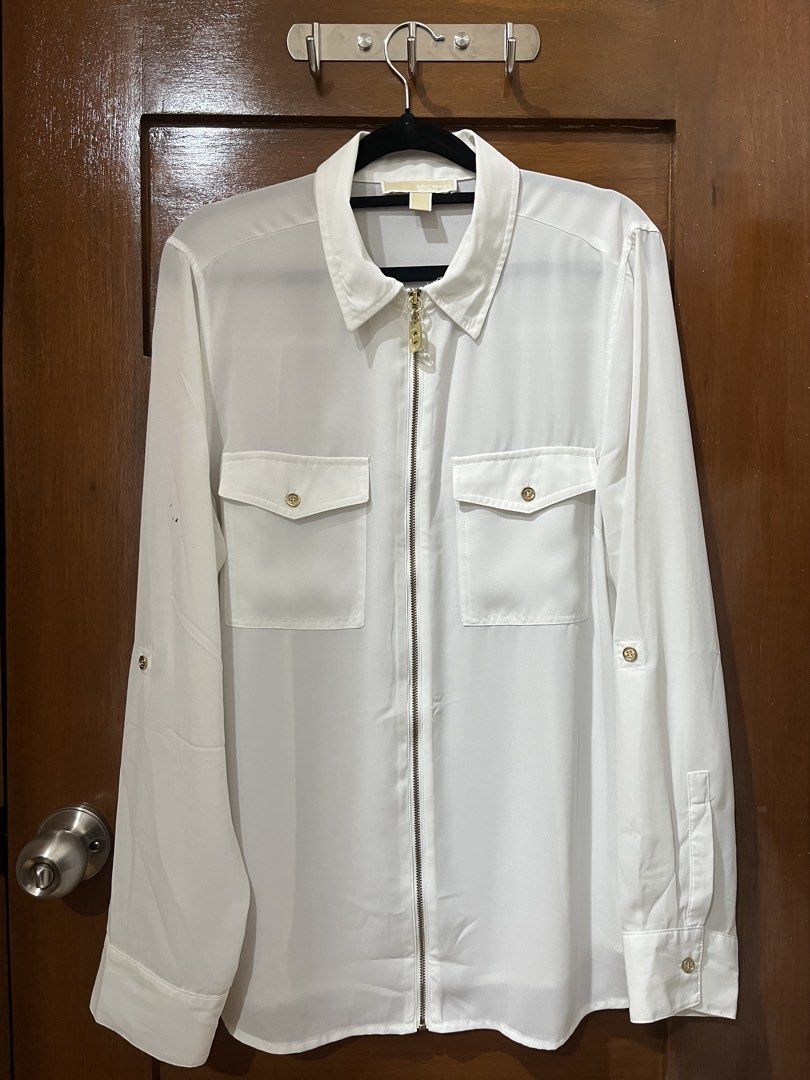 Michael Kors White Zip Up Shirt (Category: Longsleeves) located in Manila. Submitted by bbhzl (Listing ID 1464400787, Image 1). Description: - White Michael Kors long-sleeved shirt - Light blemish on the sleeve.