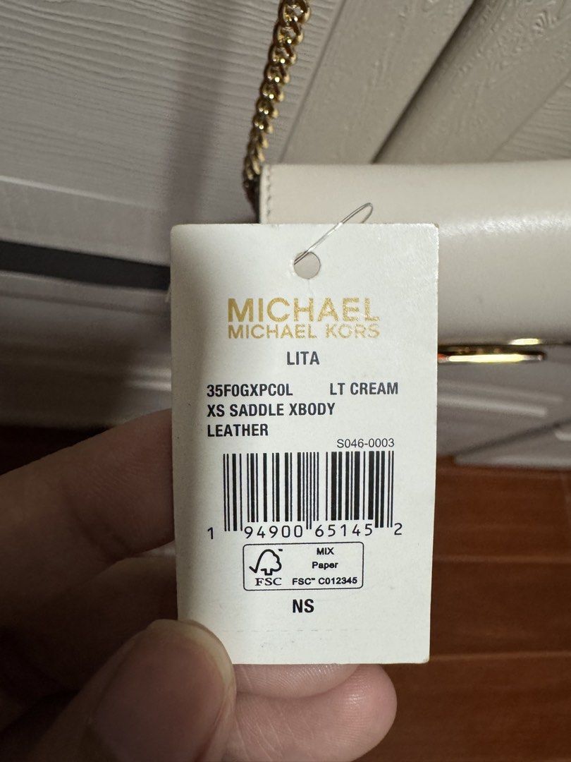 Michael Kors Xs Sling Bag (Category: Cross-body Bags) located in Manila. Submitted by nicoleaure20 (Listing ID 1464483687, Image 2). Description: brand new with tag :) after buying natambak na after hehe in good condition pa! - location: sampaloc, manila - mop: gcash/bpi - can be shipped thru lalamove/grab/ toktok/j&t but the buyer should shoulder the fee :) .