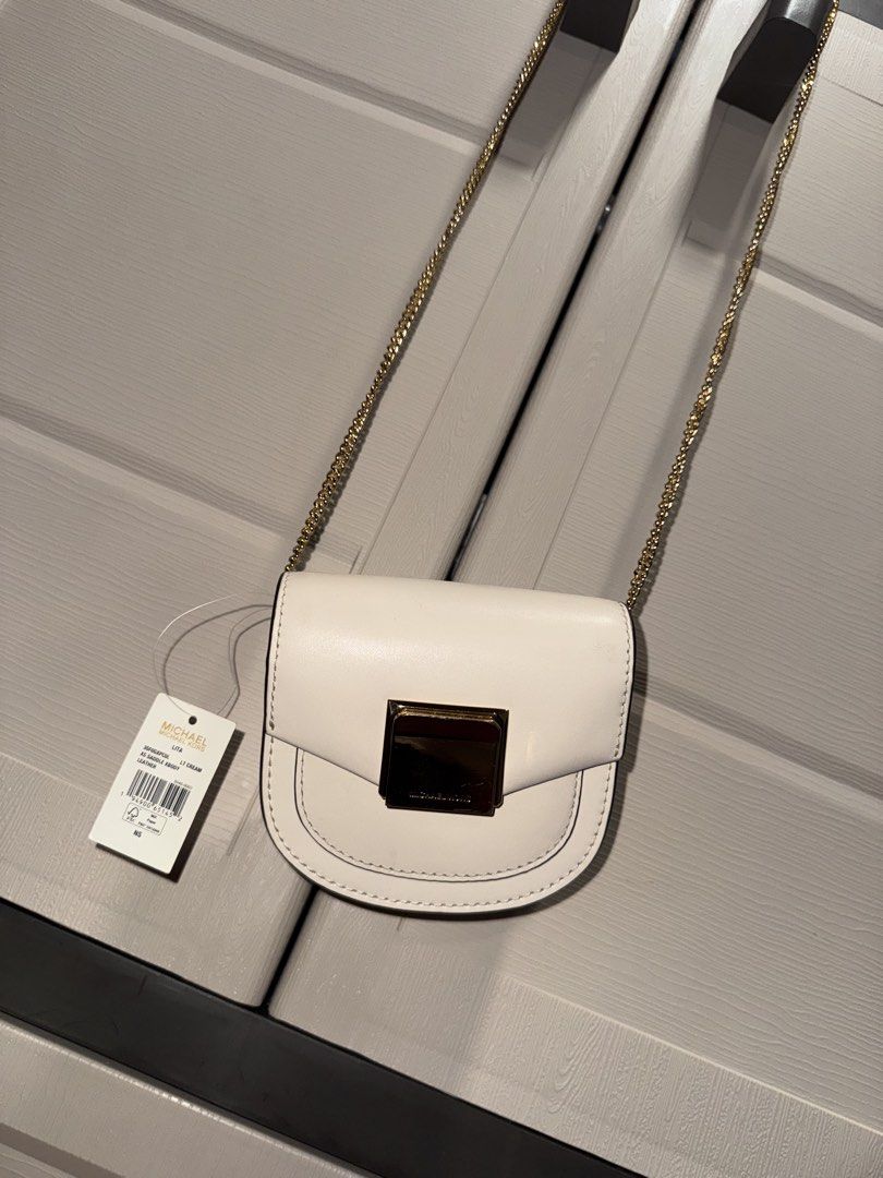 Michael Kors Xs Sling Bag (Category: Cross-body Bags) located in Manila. Submitted by nicoleaure20 (Listing ID 1464483687, Image 3). Description: brand new with tag :) after buying natambak na after hehe in good condition pa! - location: sampaloc, manila - mop: gcash/bpi - can be shipped thru lalamove/grab/ toktok/j&t but the buyer should shoulder the fee :) .