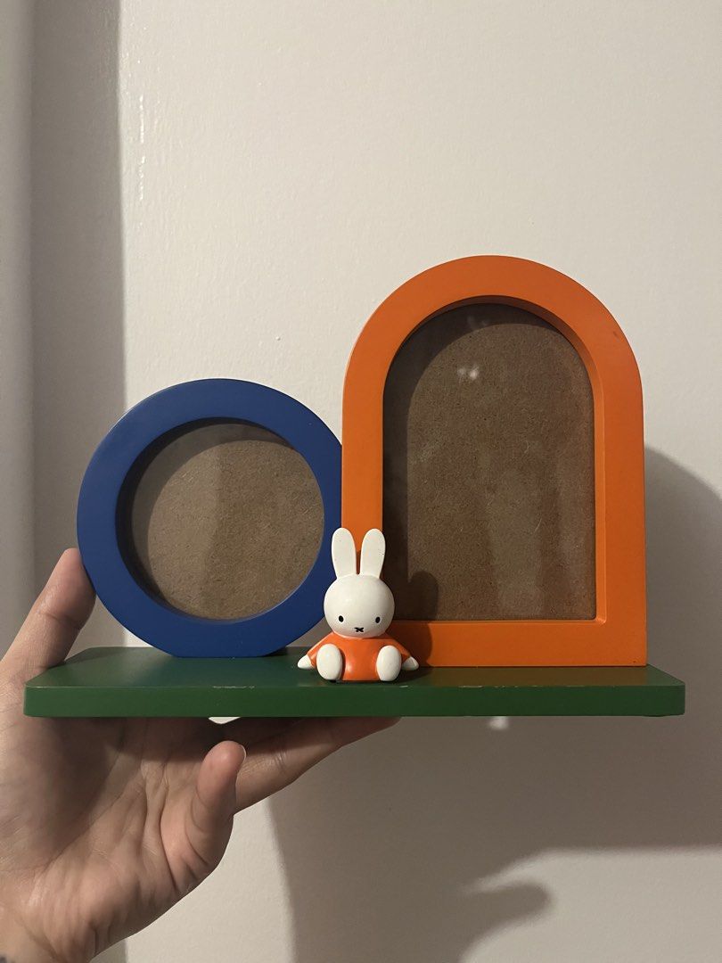 Miffy 70th Anniversary Studio CLIP Photo Frame (Category: Frames & Pictures) located in Subic. Submitted by kiniistayls (Listing ID 1464479592, Image 1). Description: - Cute Miffy photo frame from Studio CLIP - Celebrates Miffy's 70th anniversary - Includes two frames: one round and one arched - Comes with a charming Miffy figurine - Ideal for displaying your cherished memories - Please see slide 3 orange frame has a little paint chip super littl