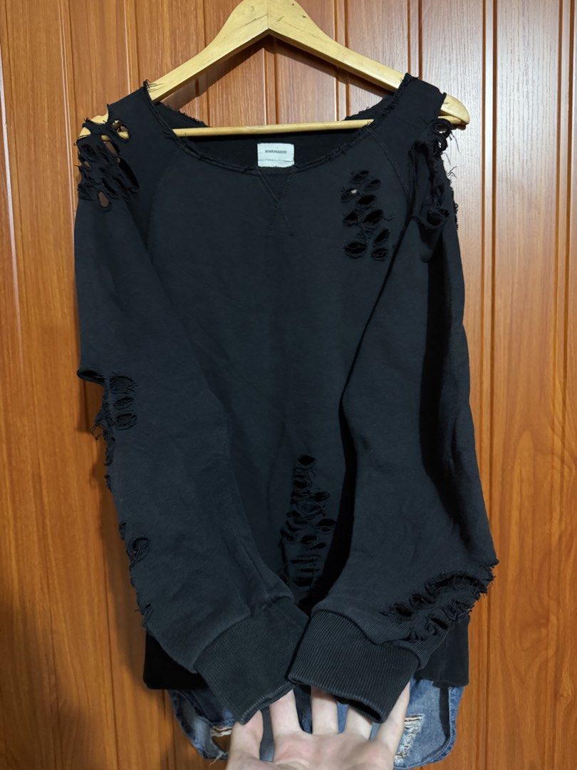MIHARAYASUHIRO Distressed Black Sweatshirt (Category: Coats, Jackets and Outerwear) located in Manila. Submitted by tlfph (Listing ID 1464539886, Image 3). Description: - Brand: MIHARAYASUHIRO - Color: Black - Style: Distressed sweatshirt - Features: All-over cut-outs and rips - Sleeves: Long with ribbed cuffs - Neckline: Crew neck - Look: Unique streetwear piece, great for layering.
