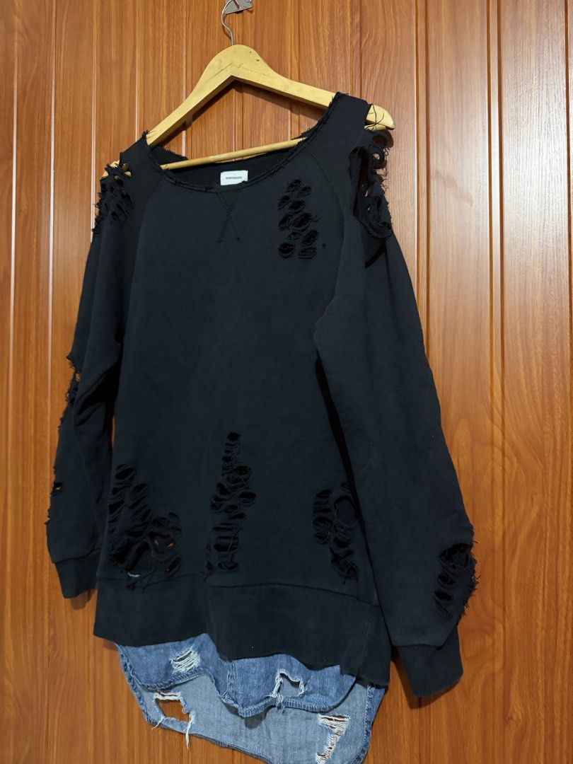 MIHARAYASUHIRO Distressed Black Sweatshirt (Category: Coats, Jackets and Outerwear) located in Manila. Submitted by tlfph (Listing ID 1464539886, Image 2). Description: - Brand: MIHARAYASUHIRO - Color: Black - Style: Distressed sweatshirt - Features: All-over cut-outs and rips - Sleeves: Long with ribbed cuffs - Neckline: Crew neck - Look: Unique streetwear piece, great for layering.