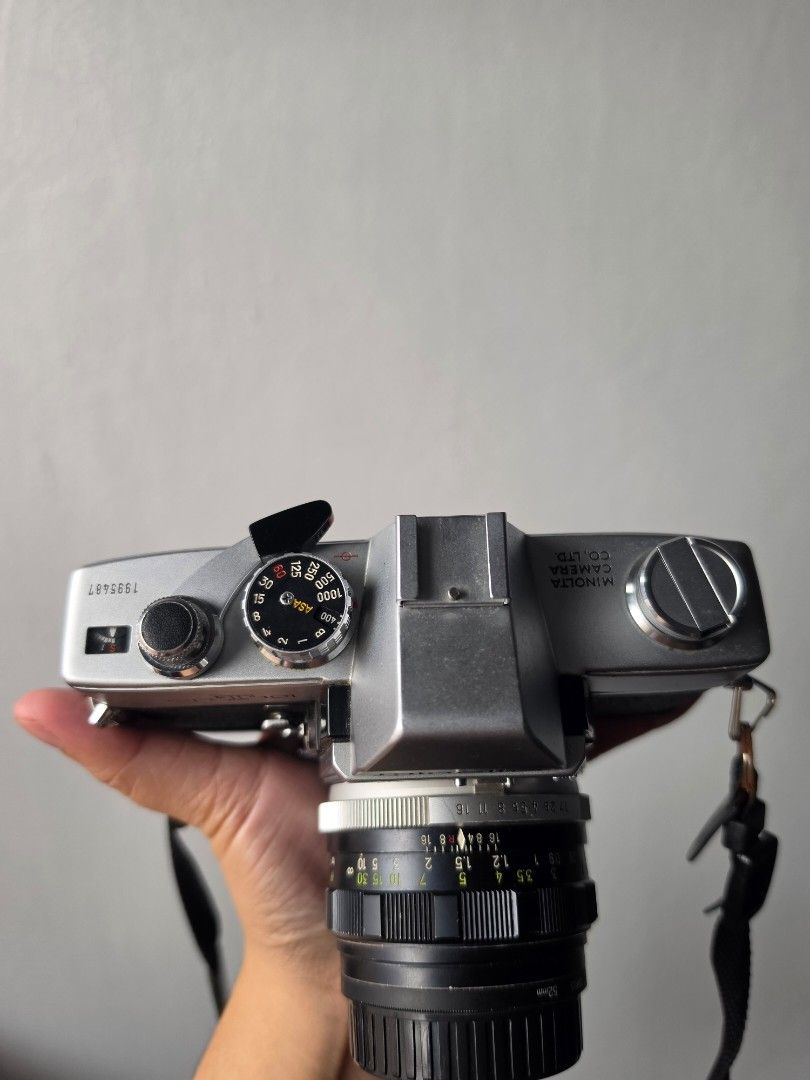 Minolta SRT 101 35mm Film Camera (Category: Cameras) located in Manila. Submitted by jaycy_ (Listing ID 1464379209, Image 3). Description: Minolta SRT 101 film camera - Classic silver and black body - Buy as is - Has not been CLA'd in 2 years. Working well last i used it. See photos for the sample shots - Minor dust in the view finder. - Free CaseLogic Bag and Lens brush/blower - Negotiable but no lowballing please ISSUE - Battery Cap cover is mi