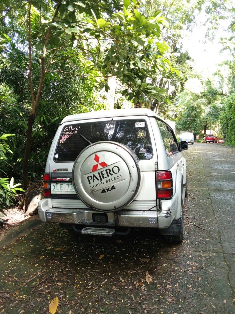 Mitsubishi Pajero Exceed Auto (Category: Used Cars) located in Antipolo. Submitted by gaburieruru (Listing ID 1464426626, Image 2). Description: MITSUBISHI PAJERO FOR SALE ₱200,000 negotiable Model: 1994 Engine: 4M40 Intercooler Turbo Diesel Transmission: Automatic Drive: 4x4 Color: Two-tone White & Silver Origin: Imported Running condition Features & Details: - 4M40 intercooler turbo diesel engine - Automatic transmission - 4x4 - With installed 