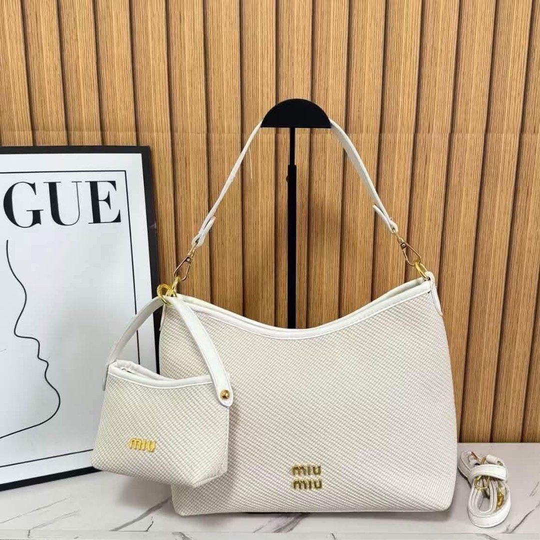 Miu Miu 2in1 shoulder bag (Category: Shoulder Bags) located in Quezon City. Submitted by stuffs.hellyy (Listing ID 1464375438, Image 1). Description: with box size: 14 inches.