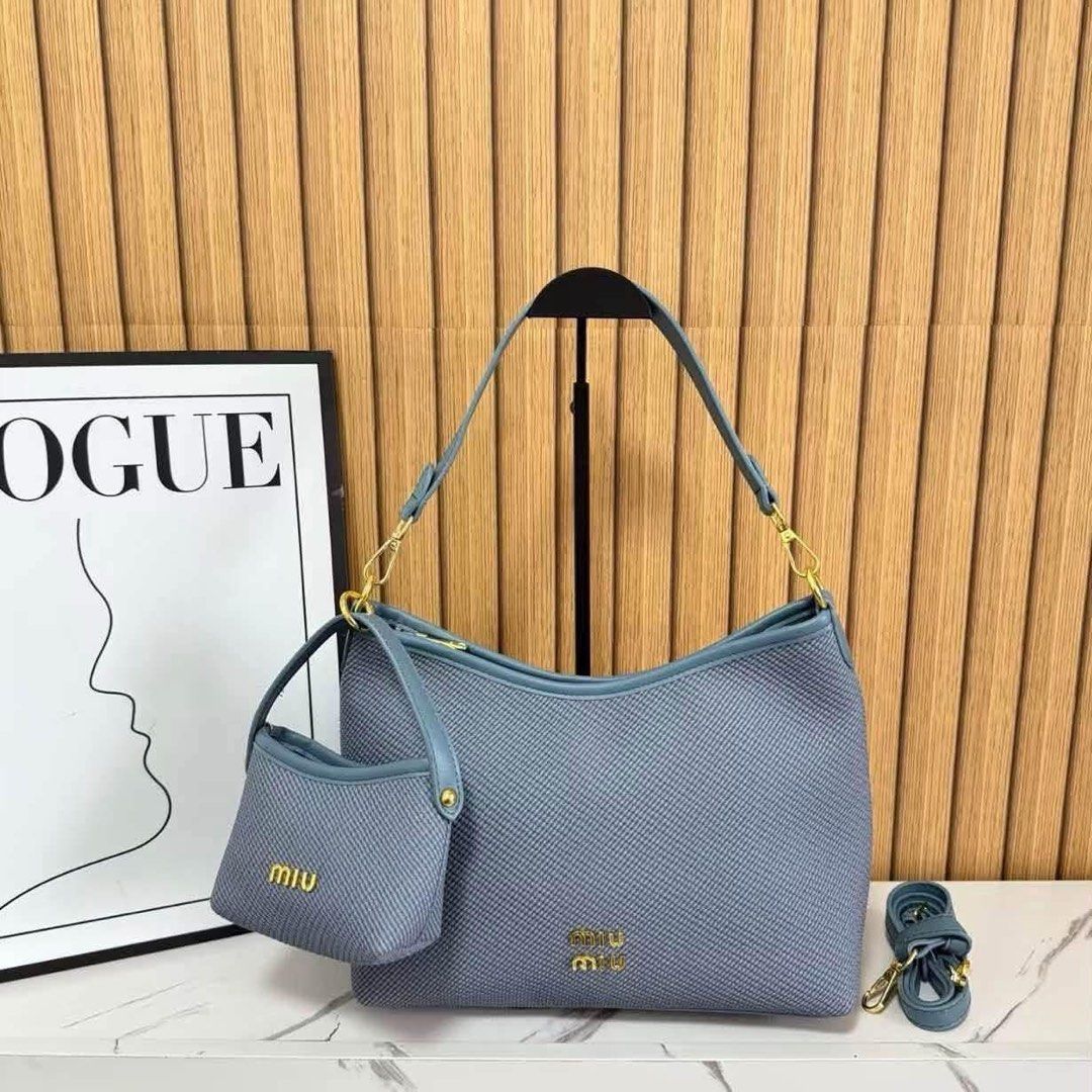 Miu Miu 2in1 shoulder bag (Category: Shoulder Bags) located in Quezon City. Submitted by stuffs.hellyy (Listing ID 1464375438, Image 2). Description: with box size: 14 inches.
