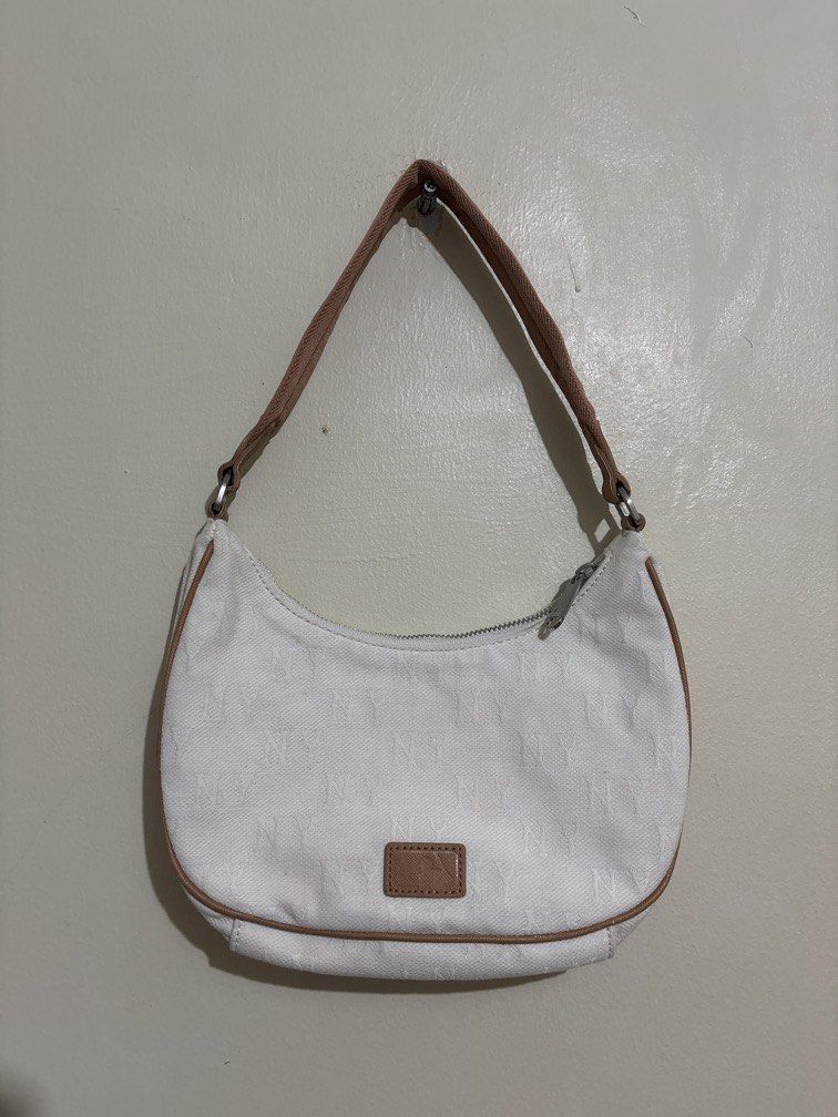 MLB NY Yankees Monogram Hobo bag (Category: Shoulder Bags) located in Muntinlupa City. Submitted by owrayttttt (Listing ID 1464458402, Image 2). Description: - MLB NY Yankees Monogram Hobo bag - 9 inches length, 5 inches height - No issue, just needs minor cleaning - Free shipping via j&t.