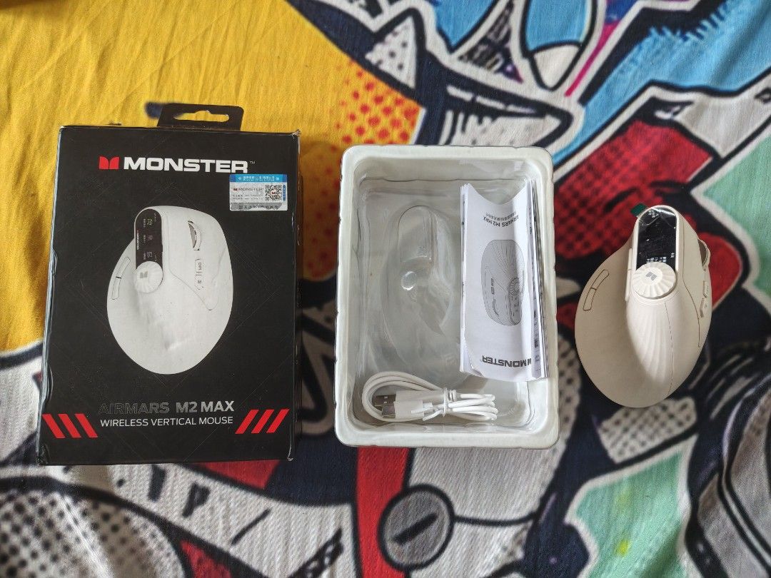 Monster AirMars M2 Max Wireless Vertical Mouse (Category: Mouse & Mousepads) located in Virac. Submitted by gegosar (Listing ID 1464360667, Image 1). Description: - Monster AirMars M2 Max Wireless Vertical Mouse - Color: Beige - Ergonomic design for ultimate comfort - Features a unique small screen on top - Includes charging cable and user manual - Ideal for extended computer sessions - Excellent working condition - 2nd hand.