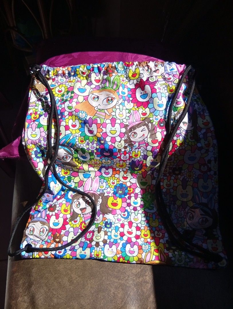 Murakami x Newjeans drawstring bag (Category: Tote Bags) located in Cabadbaran. Submitted by lagiuminomtubig1 (Listing ID 1464359948, Image 2). Description: As new po No issue.