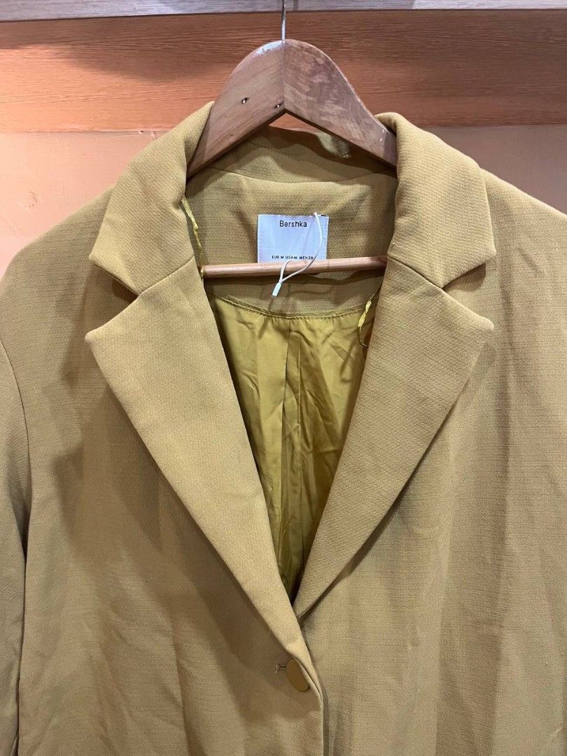 Mustard Classic Long Coat Bershka (Category: Coats, Jackets and Outerwear) located in Quezon City. Submitted by michypeachyy1 (Listing ID 1464494370, Image 3). Description: 500 plus shipment width 21.5 inches length 36 inches.