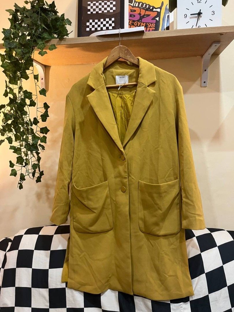 Mustard Classic Long Coat Bershka (Category: Coats, Jackets and Outerwear) located in Quezon City. Submitted by michypeachyy1 (Listing ID 1464494370, Image 1). Description: 500 plus shipment width 21.5 inches length 36 inches.