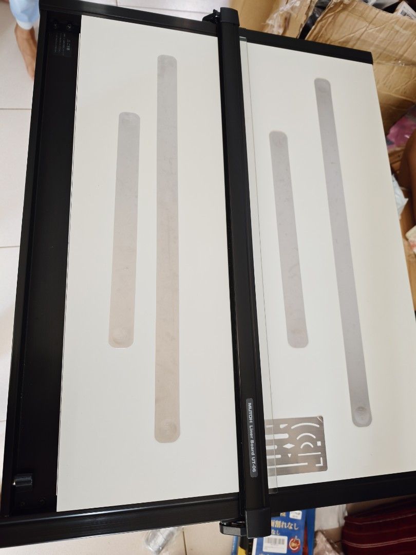MUTOH Liner Board UT-06 Drafting Table (Category: Stationery & School Supplies) located in Manila. Submitted by liamsureplus.1995 (Listing ID 1464364992, Image 2). Description: - MUTOH Liner Board UT-06 - Made in Japan - Adjustable drafting board with integrated ruler mechanism - Clean white surface with guide lines - Ideal for technical drawing and design work - Feel free to ask questions!.