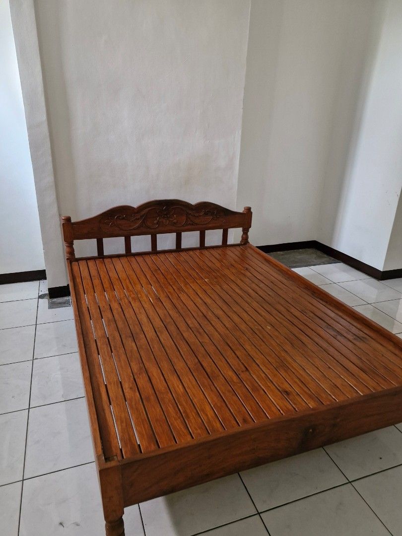 Narra Bed Frame (Category: Bed Frames & Mattresses) located in Meycauayan. Submitted by kookiesandv (Listing ID 1464404465, Image 1). Description: Pre-loved bed frame made out of narra wood Super durable and has already been in the family for a decade. Reason for selling: Moving out and decluttering; will be moving to a smaller place so can't bring the bed frame with me PM for more information :).