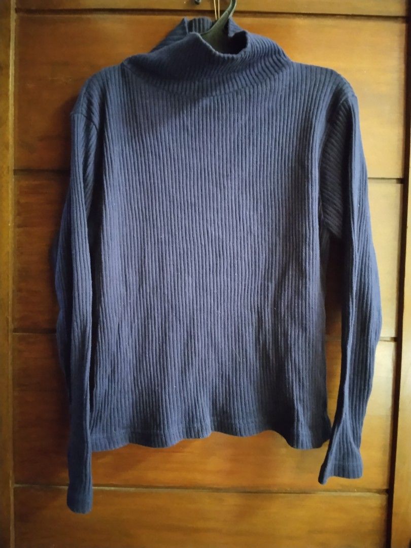 Navy Blue Ribbed Turtleneck Long Sleeve Sweater (Category: Longsleeves) located in Rizal. Submitted by gentlebear-6e31 (Listing ID 1464440573, Image 1). Description: - Classic navy blue ribbed turtleneck sweater - Long sleeves - Comfortable fit - Ribbed texture for added detail - Perfect for layering or wearing on its own - Easily pairs with jeans or skirts - A versatile wardrobe essential.