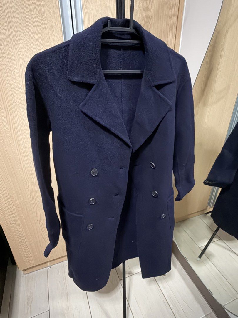 Navy Double-Breasted Wool Blend Coat (Category: Coats, Jackets and Outerwear) located in Makati City. Submitted by tenderjoycee (Listing ID 1464440291, Image 2). Description: Color: Navy Blue Size: Can fit to Small- Medium Womens - Classic navy double-breasted coat - Features two rows of buttons - Includes pockets - Ideal for cooler weather - Versatile for dressing up or down Actual color may vary due to lighting. Super nice in actual. Can be del