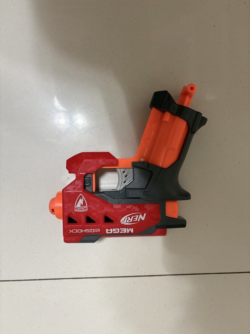 Nerf Mega Bigshock Blaster Toy Gun (Category: Action & Battle Toys) located in Taytay. Submitted by justinqt (Listing ID 1464387558, Image 1). Description: - Nerf Mega Bigshock blaster - Color: Orange and Red - Fires Nerf Mega darts - Perfect for kids' playtime - Fun and easy to use - Ready for action!.