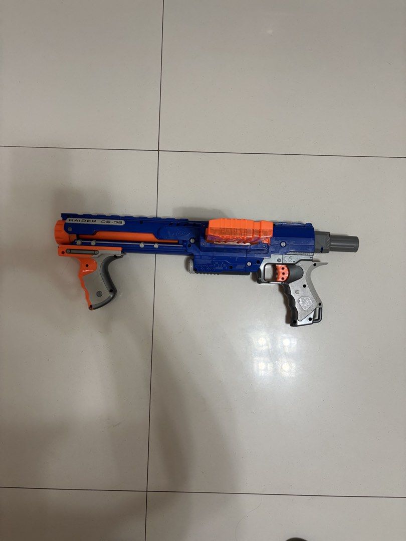Nerf Raider CS-6 Blaster Toy Gun (Category: Action & Battle Toys) located in Taytay. Submitted by justinqt (Listing ID 1464386830, Image 2). Description: - Blue and orange Nerf Raider CS-6 blaster - Comes with the magazine - Pump-action for easy firing - Perfect for kids' playtime or collectors - Get ready for exciting fun!.