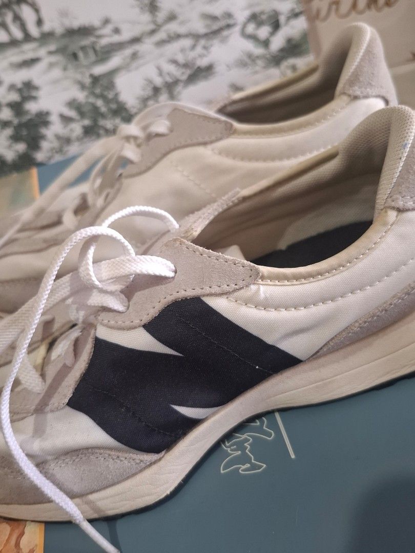 New Balance 327 Sneakers (Category: Sneakers) located in Marikina City. Submitted by bags21.ph (Listing ID 1464371069, Image 3). Description: - Brand New Balance - Model 327 - Colorway: Classic Off-White and Grey - Features iconic 'N' logo on the side - Perfect for casual everyday wear.