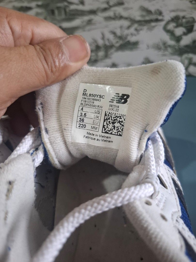 New Balance ML850YSC Sneakers White Blue (Category: Sneakers) located in Marikina City. Submitted by bags21.ph (Listing ID 1464372853, Image 2). Description: - Brand: New Balance - Model: 850 - Type: Kids' Sneakers - Size: US 3.5 (UK 3, EU 36) - Color: White with blue and black accents - Origin: Made in Vietnam - Ideal for: Everyday wear.