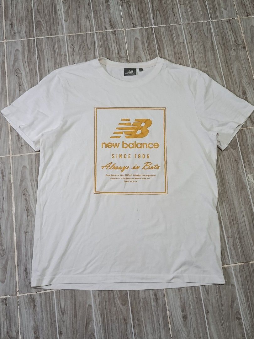 NEW BALANCE TSHIRT (freeshipping) (Category: Tshirts & Polo Shirts ) located in Quezon City. Submitted by gyl-stop (Listing ID 1464526278, Image 1). Description: free shipping 22.5 x 28 very good condi cr: 9.5/10 issue: dot stains sa baba ng logo.