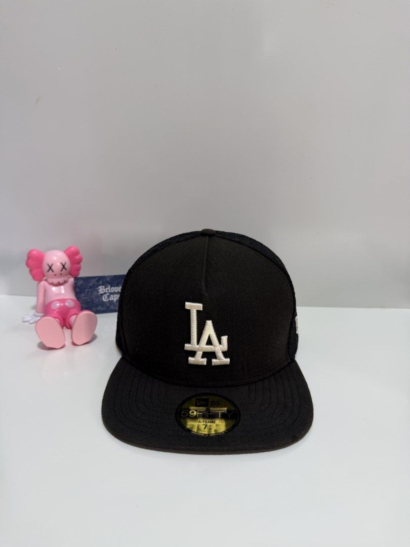 New Era Los Angeles Dodgers 59fifty Aframe (Category: Caps & Hats) located in Valenzuela. Submitted by belovedcatdad (Listing ID 1464499148, Image 1). Description: - Authentic New Era 59FIFTY fitted cap - Classic black colorway - Features a unique textured side panel - Official MLB logo embroidered on the back - Ideal for any Los Angeles Dodgers fan.