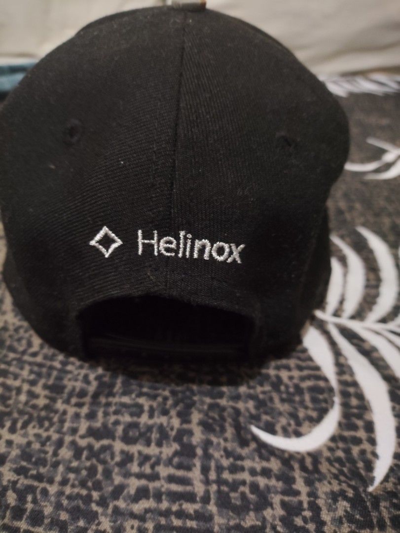 New Era x Helinox Collaboration Snapback Cap (Category: Caps & Hats) located in Quezon City. Submitted by tuubbs (Listing ID 1464415146, Image 2). Description: - Black snapback cap - Camouflage brim - Diamond logo on front - Helinox logo embroidered on back - New Era branding on side - Adjustable snapback closure - Perfect for casual wear novaliches nitang loc pwede lalamove pwede rin jnt sa malayo .