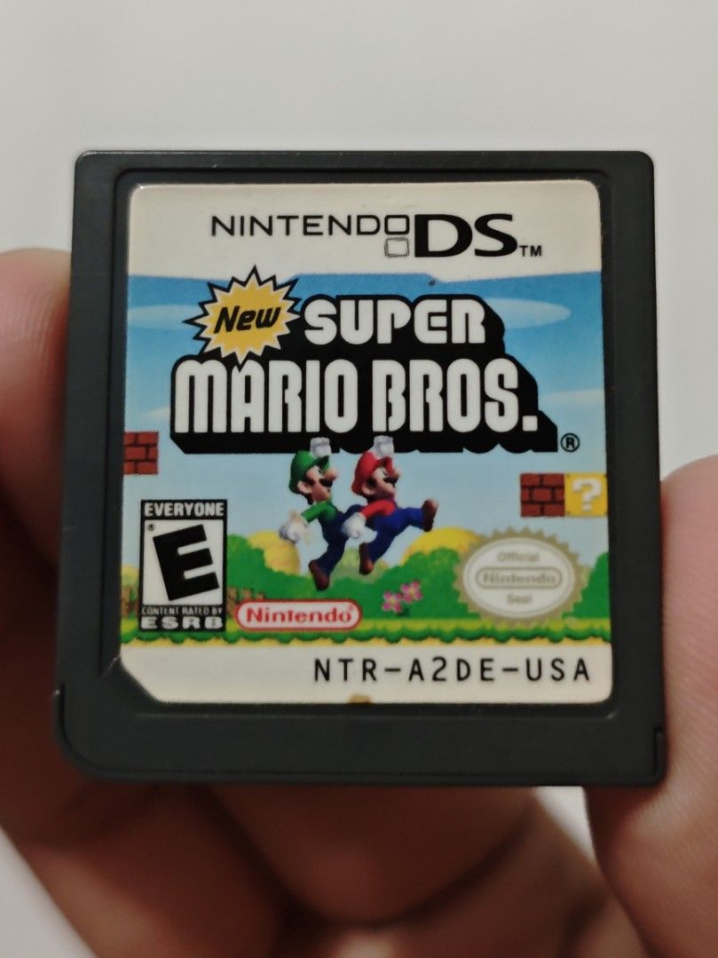 New Super Mario Bros. (Nintendo DS) (Category: Nintendo) located in Quezon City. Submitted by tineetatinee (Listing ID 1464511705, Image 1). Description: 𝗔𝗯𝗼𝘂𝘁 𝘁𝗵𝗲 𝗚𝗮𝗺𝗲 • This game is tested working. • I can send additional pictures/videos upon request. • No manual and box. • RFS: Bought a new CIB copy. • Can be traded to other Authentic Nintendo DS game. 𝗧𝗿𝗮𝗻𝘀𝗮𝗰𝘁𝗶𝗼𝗻 𝗠𝗲𝘁𝗵𝗼𝗱𝘀 • Delivery: Lalamove or J&T • Payment: GCa