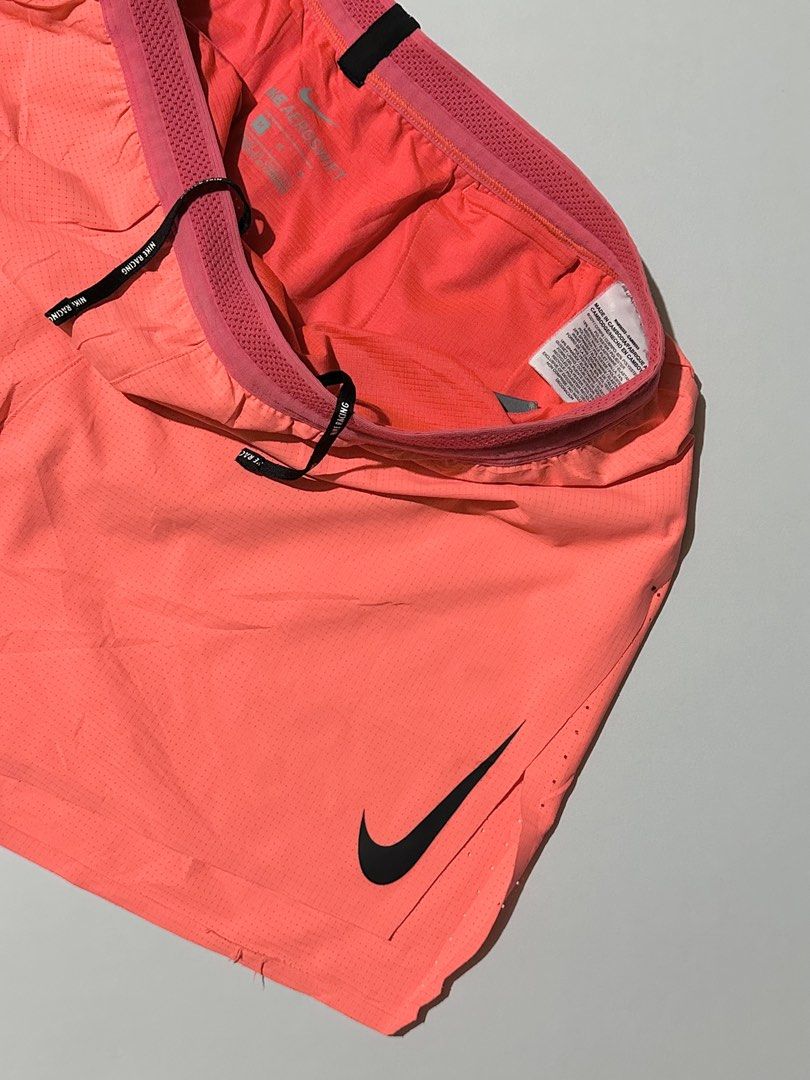 Nike Aeroswift Men’s Running Short (Category: Activewear) located in Manila. Submitted by reclaimed.shop (Listing ID 1464450640, Image 2). Description: Description: Elite-level Nike AeroSwift running shorts engineered for speed, lightweight comfort, and breathability. Designed with a 4” inseam and split hem to provide unrestricted movement during fast-paced runs and racing. ✔️ Color: Fusion Red / Bright Crimson / Black ✔️ 4” inseam (approx. 10 cm