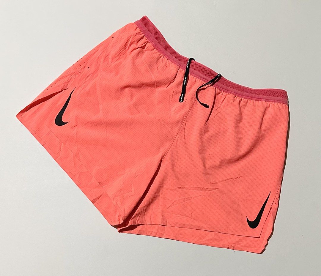 Nike Aeroswift Men’s Running Short (Category: Activewear) located in Manila. Submitted by reclaimed.shop (Listing ID 1464450640, Image 1). Description: Description: Elite-level Nike AeroSwift running shorts engineered for speed, lightweight comfort, and breathability. Designed with a 4” inseam and split hem to provide unrestricted movement during fast-paced runs and racing. ✔️ Color: Fusion Red / Bright Crimson / Black ✔️ 4” inseam (approx. 10 cm