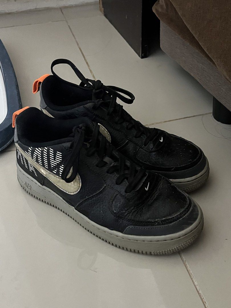 Nike AF 1 ’07 LV8 Black/Metallic Silver (Category: Sneakers) located in San Pablo. Submitted by rainedear_ (Listing ID 1464448581, Image 1). Description: - Black Nike Air Force 1 sneakers - Features a gold Nike swoosh - Orange accents on the heel tab - Black laces - Grey soles - Visible scuffs and wear on leather, but plenty of life remaining.