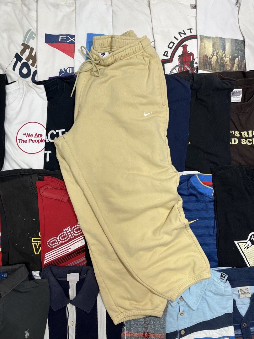Nike Beige Sweatpants (Category: Joggers) located in Baao. Submitted by plainclothesdept (Listing ID 1464529292, Image 1). Description: Ni/ke Side Swoosh Sweatpants waist - 30-34 in. length - 36 in. thigh - 13 in. hem - 6 in. few stains 950 - Beige Nike sweatpants - Comfortable and casual - Classic embroidered Nike swoosh logo on leg - Drawstring waist for adjustable fit - Minor marks on fabric (please check photos) - Ideal for lounging or everyd