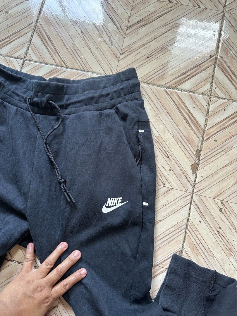 Nike Black Jogger Sweatpants Size M (Category: Joggers) located in Angeles City. Submitted by alejeong27 (Listing ID 1464388002, Image 3). Description: - Black Nike sweatpants - Size M - Elastic waistband with drawstring - Side pockets - Ribbed cuffs - Ideal for lounging or workouts - Comfortable material.