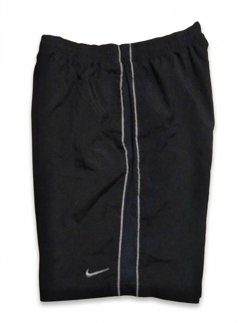 Nike Black Running Shorts Size L (Category: Activewear) located in Quezon City. Submitted by aljonbermu25659 (Listing ID 1464360256, Image 1). Description: - Black Nike running shorts - Size L - 100% Polyester - Comfortable elastic waistband - Reflective stripe details on sides and front - Perfect for workouts or casual wear.