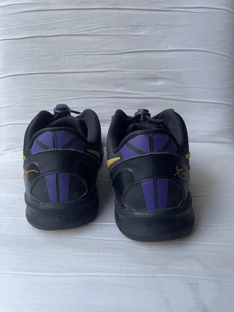 Nike Kobe VIII 2Y (Category: Babies & Kids Fashion) located in Paranaque City. Submitted by smconsul (Listing ID 1464462718, Image 3). Description: - Authentic Nike Kobe Mamba Focus basketball shoes - Color: Black with gold swoosh and purple accents - Closure: Lace-up with toggle - Versatile: Great for basketball or casual wear - Condition: Shows some signs of wear on soles and uppers, but still has plenty of life left Loc: Las Pinas Delivery: j&